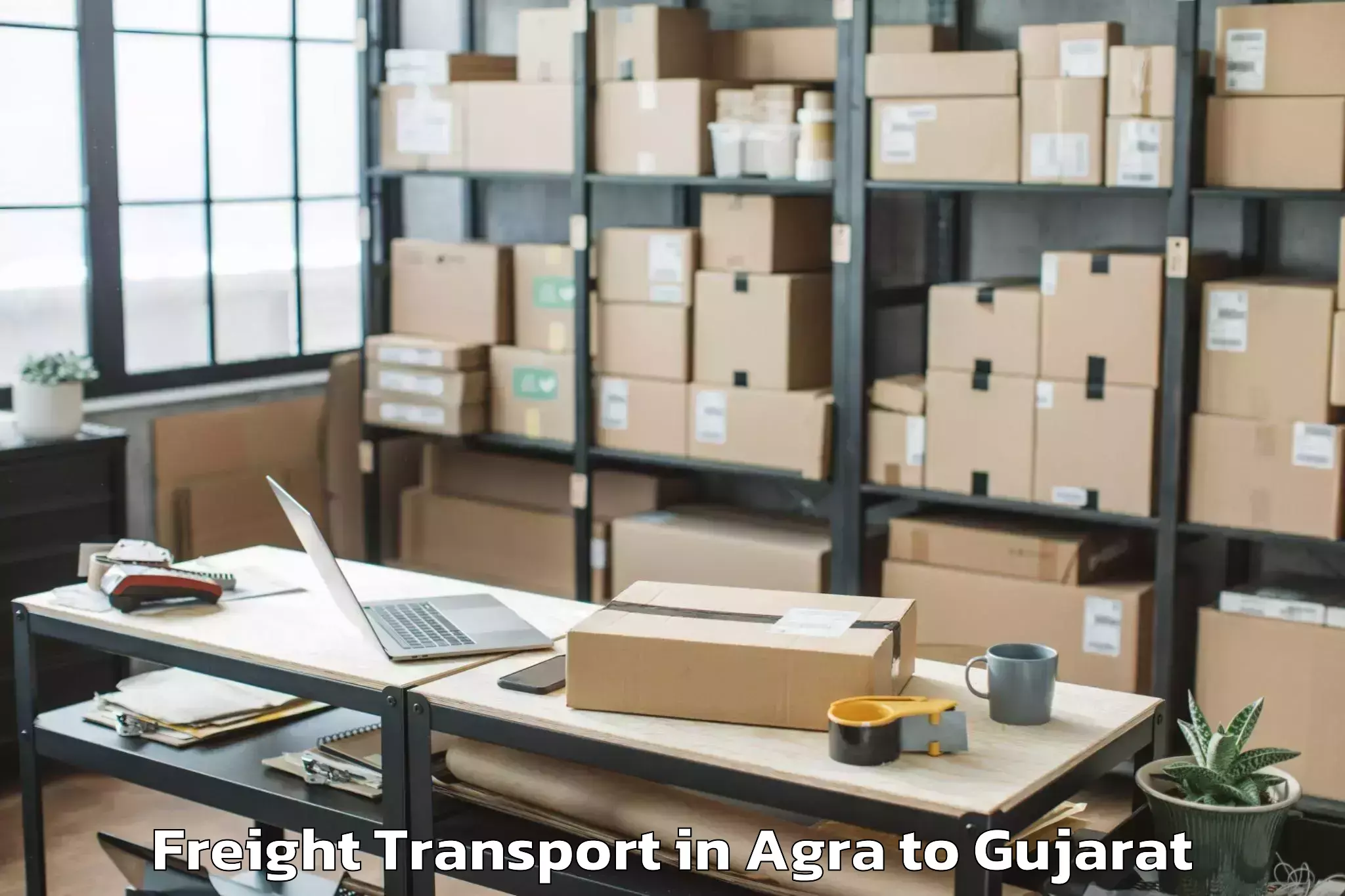 Hassle-Free Agra to Kamdhenu University Gandhinaga Freight Transport